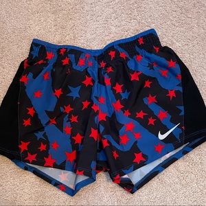 Nike running shorts, size Xtra small, red, blue, and black, great condition,